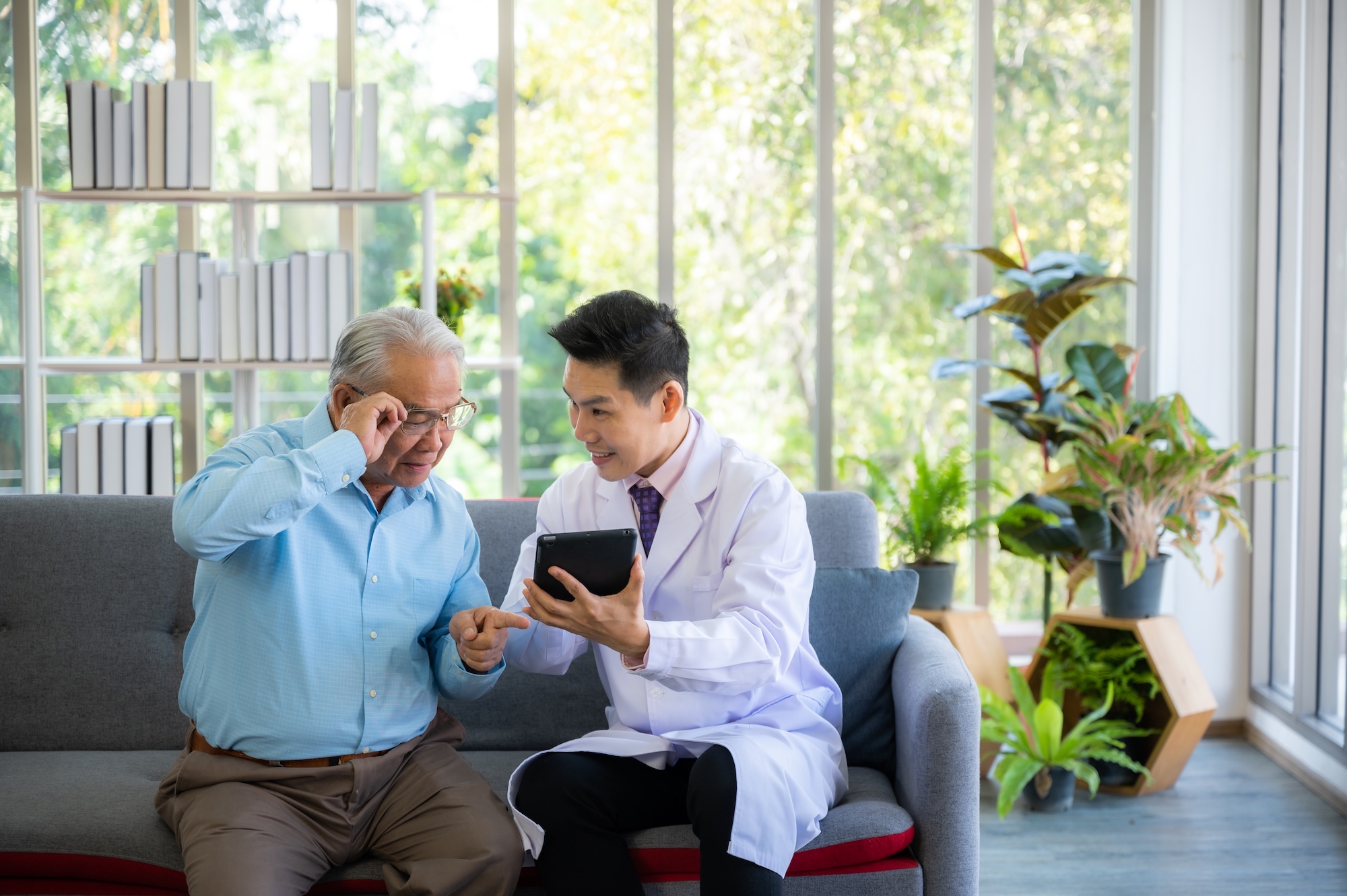 elderly patient old man in concept of health insurance, visit professional doctor at hospital
